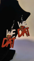 We Dat Atlanta Falcons 3D printed earrings, front view on display bust